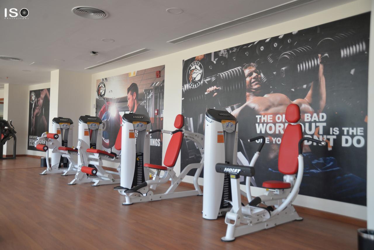 Tolip El Narges Hotell Kairo Exteriör bild A row of machines at a gym