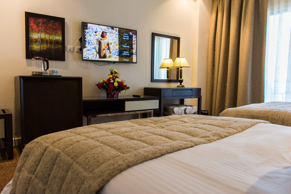 Tolip El Narges Hotell Kairo Exteriör bild A room at the hotel