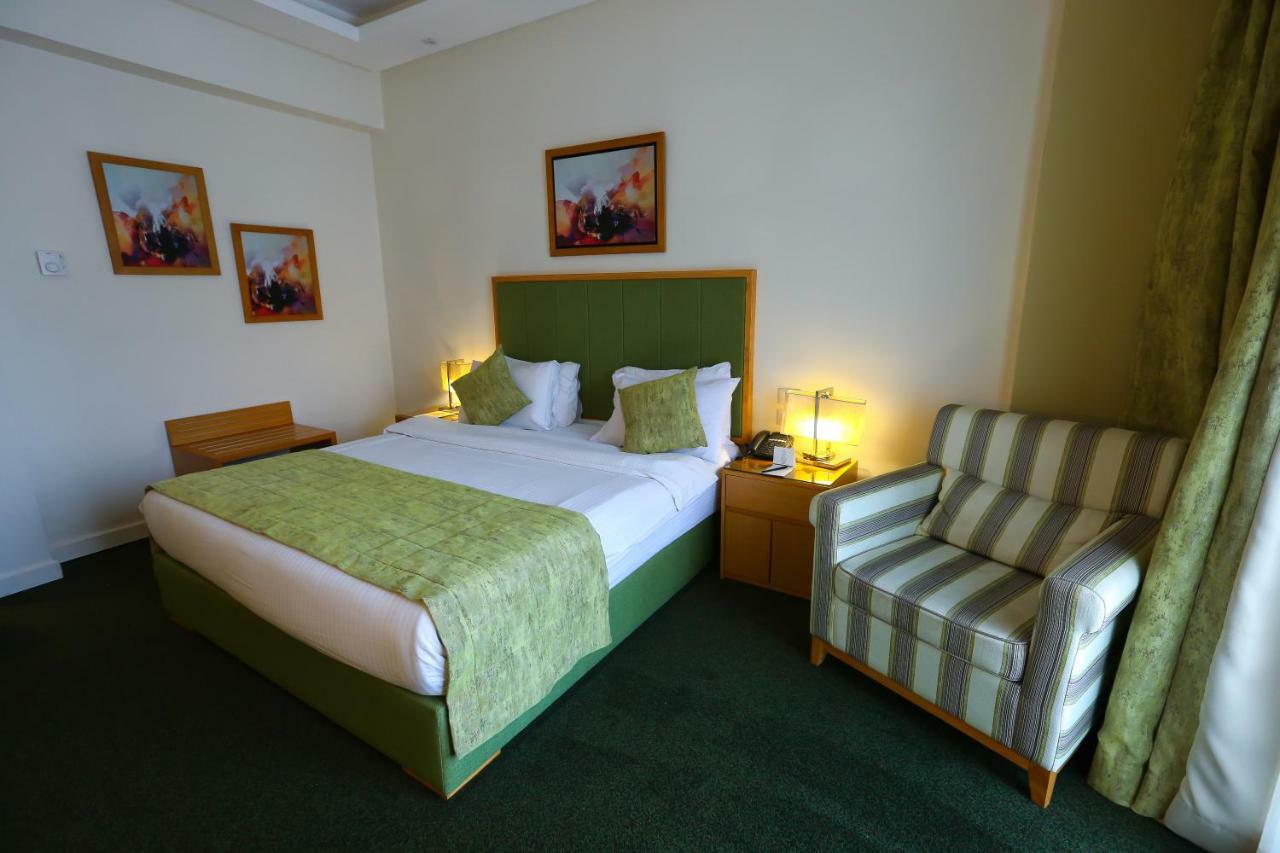 Tolip El Narges Hotell Kairo Exteriör bild A room at the hotel